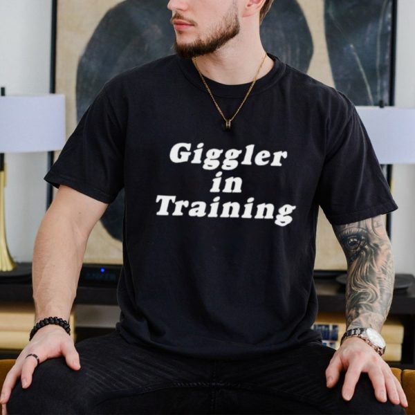 Giggler in training shirt