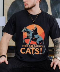 Official Donald Trump They Are Eating The Cats Funny Meme Trump Riding Cat Shirt