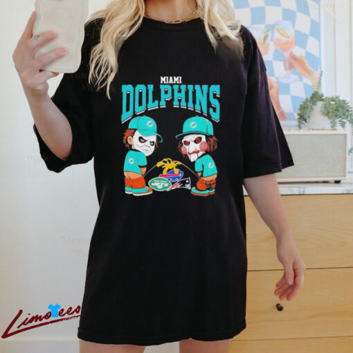 Official Michael Myers And Billy The Puppet X Miami Dolphins Pee On NFL Teams Halloween 2024 Shirt