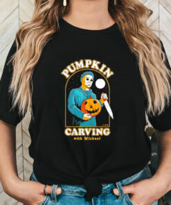 Pumpkin carving with Michael Myers Halloween shirt